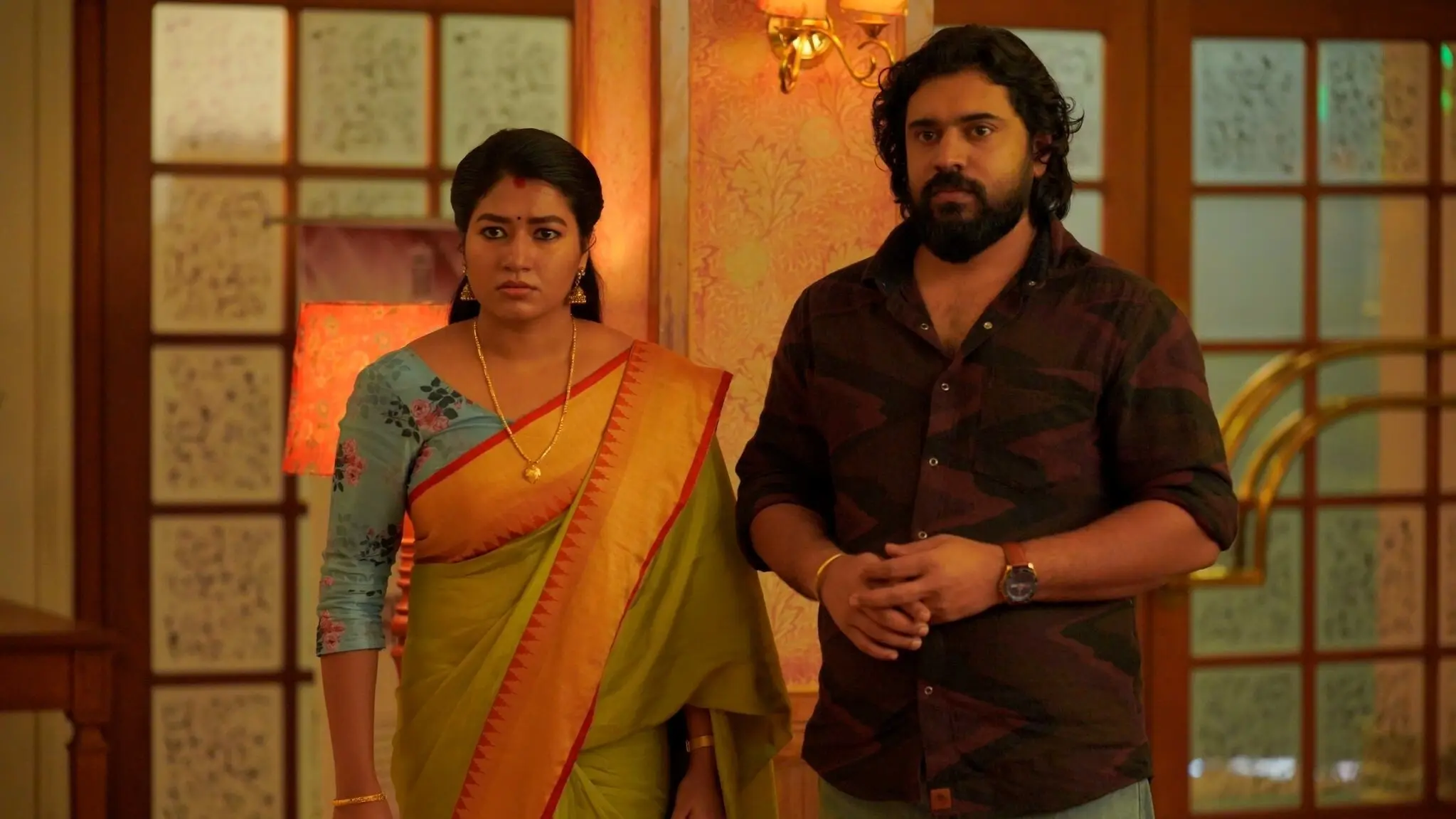 Kanakam Kaamini Kalaham backdrop