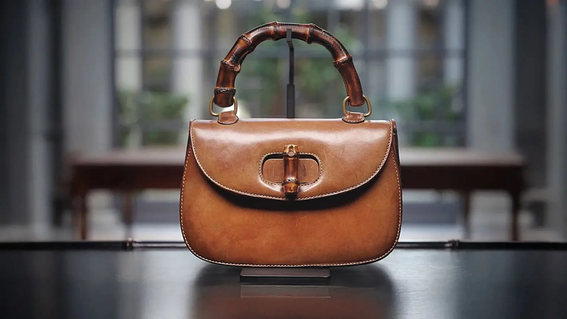 Gucci : luxe, drame et volupté backdrop