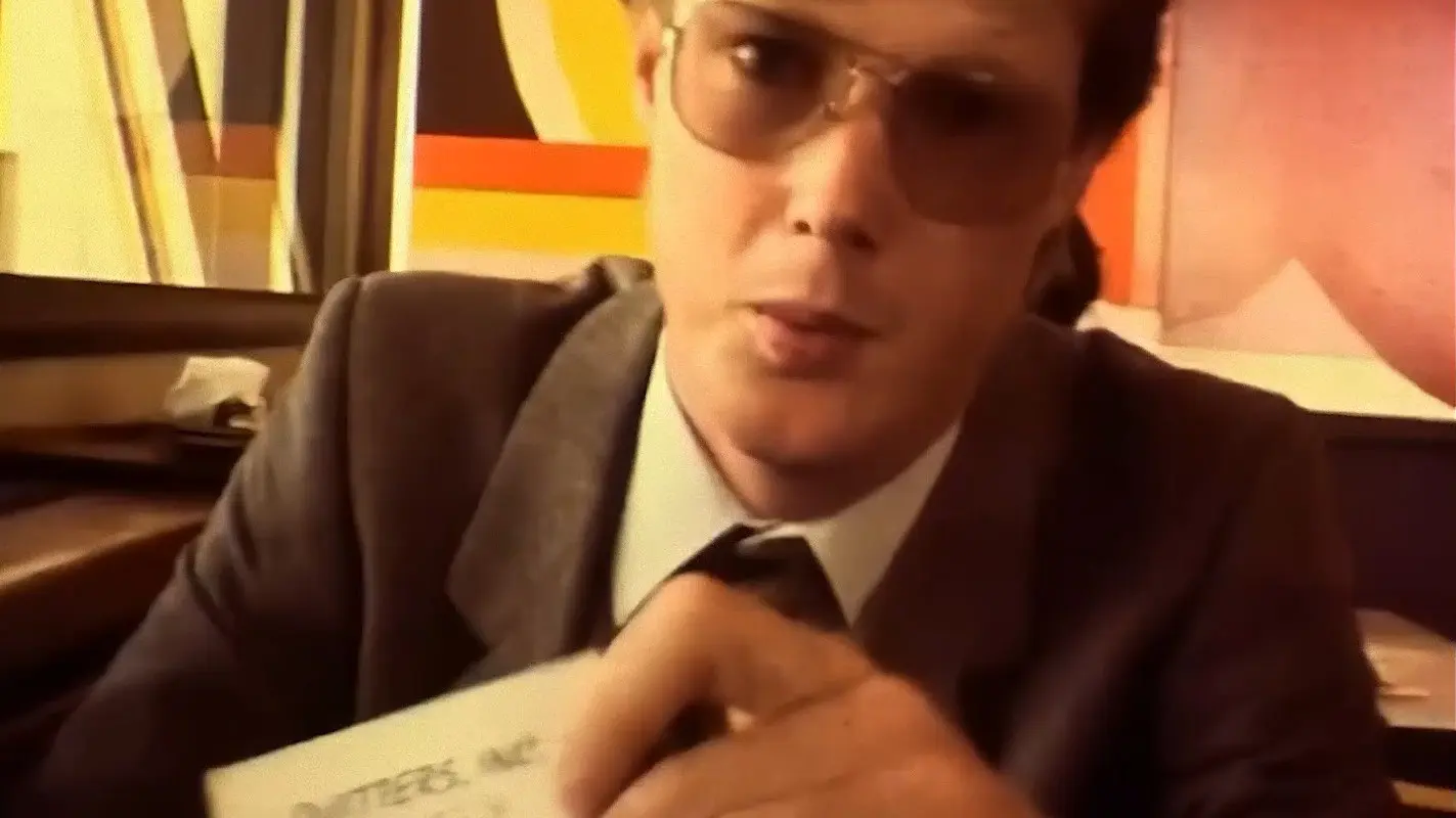 Quitters, Inc backdrop